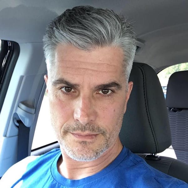 Rick Hearst sitting in a car
